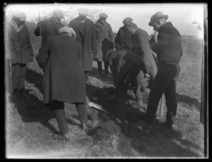 Men digging during the Cote murder investigation.