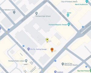 Map of Congress Street/Elm Street block. Orange pin shows Metropolitan Apartments, yellow pin shows location of Philip’s body.