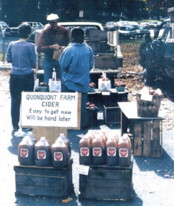 Howard Hoxie selling his apple cider at Amherst Farmers Market.