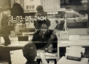 Surveillance footage of Charline Rosemond making a withdrawal of cash prior to her murder.