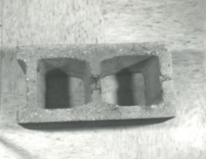 Cinderblock collected as evidence.